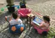 Spațiu de joacă pentru copii și terasă pentru cititul în aer liber, în fața Bibliotecii TAM