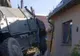 Un blindat NATO a rupt gardul unei case din Covasna și a ajuns în curte